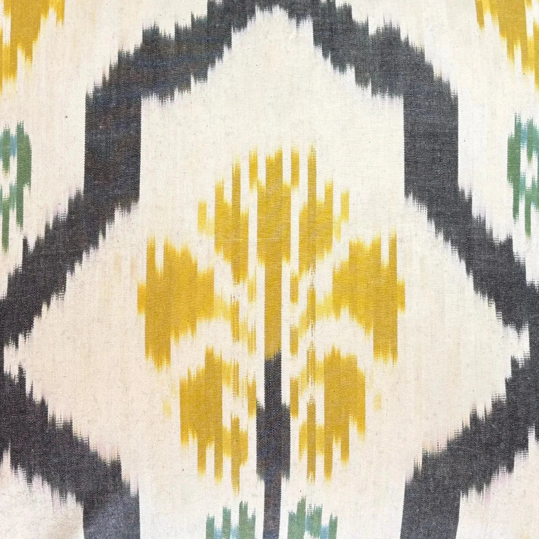 ikat decorative pillow cover with vibrant traditional textile pattern