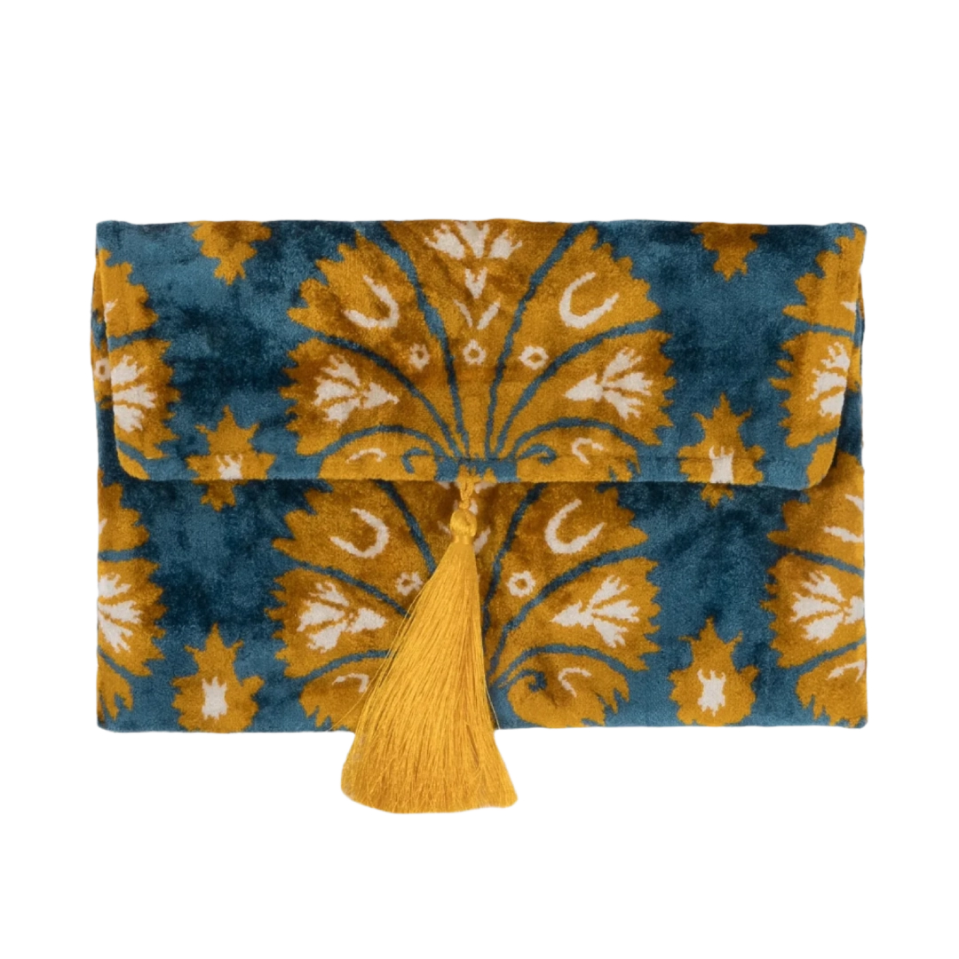 Saffron gold fan flowers on an azure blue silk velvet clutch with a gold tassel