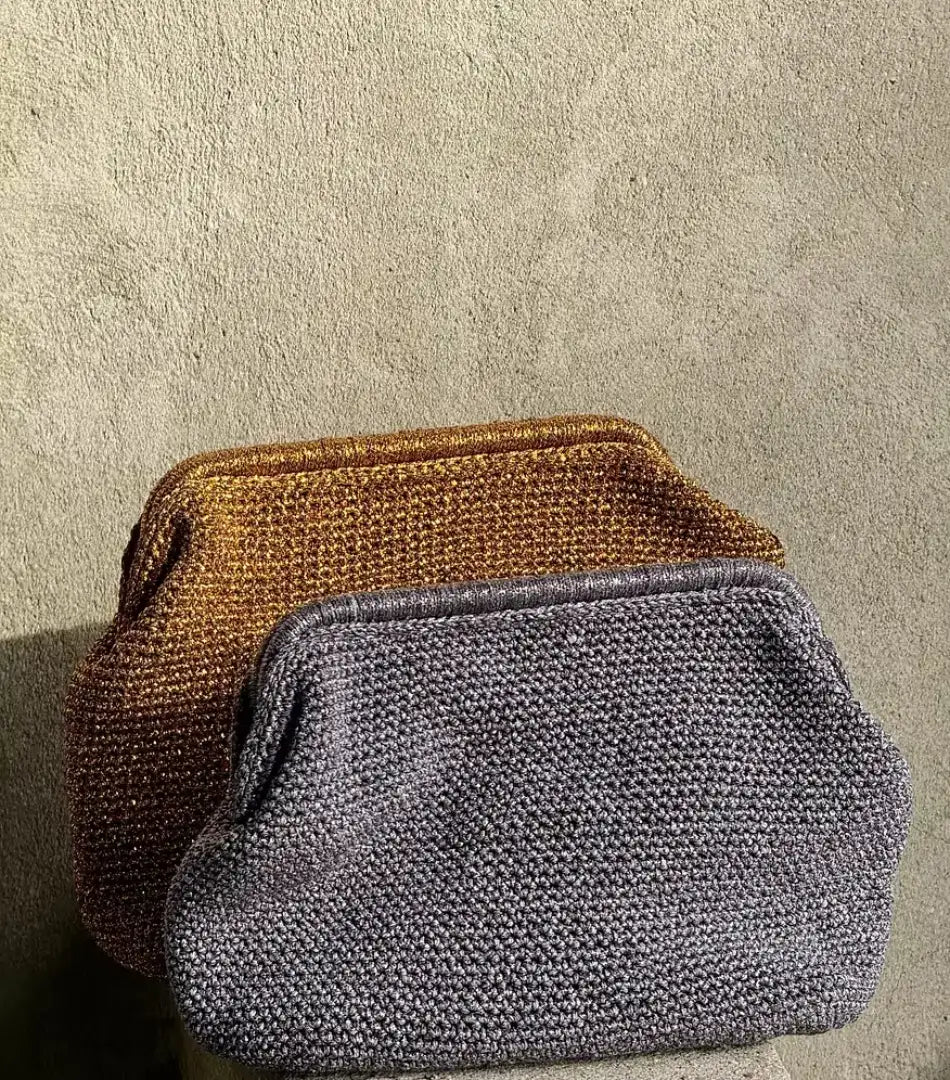 Gold and silver Sabine metallic crochet clutches angled side by side