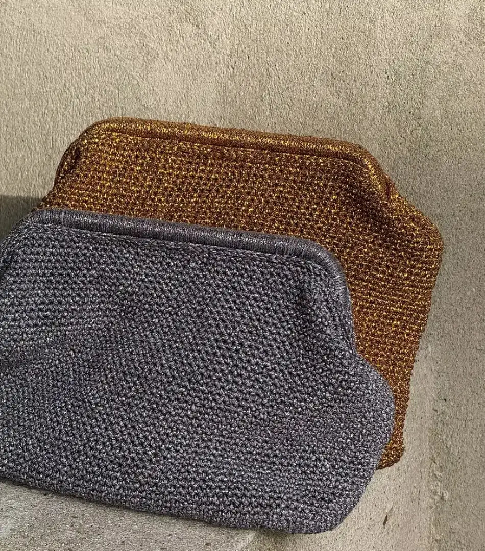 Sabine metallic crochet clutches in gold and silver shown together