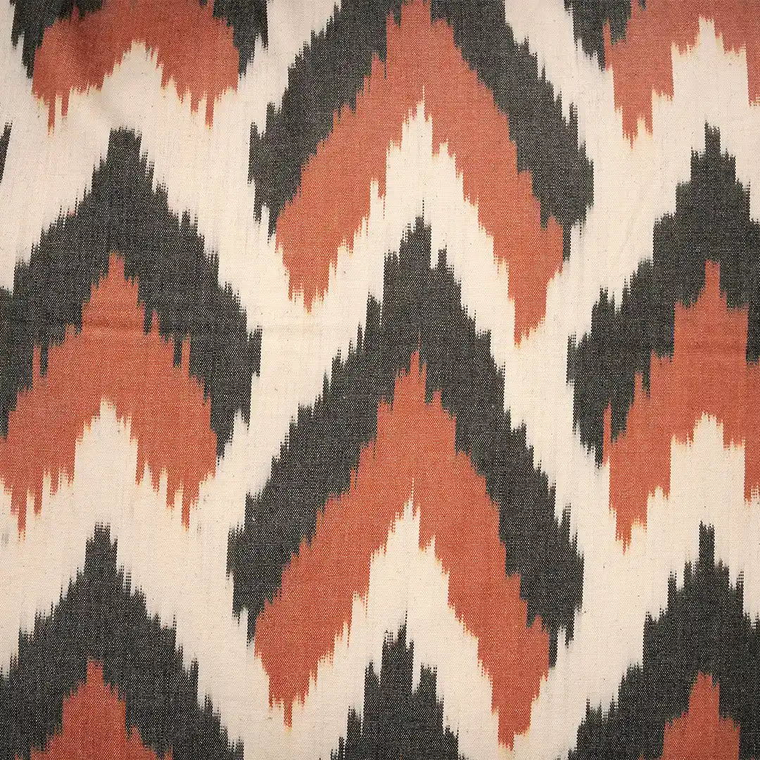 Close-up of the cinnamon and charcoal ikat chevron weave