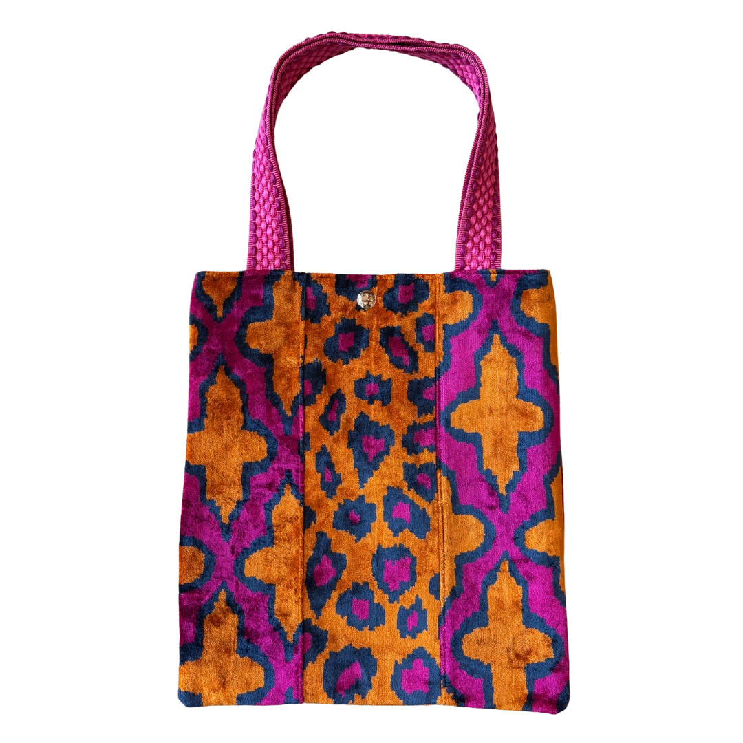 Orange leopard silk velvet shoulder bag with fuchsia medallion side panels