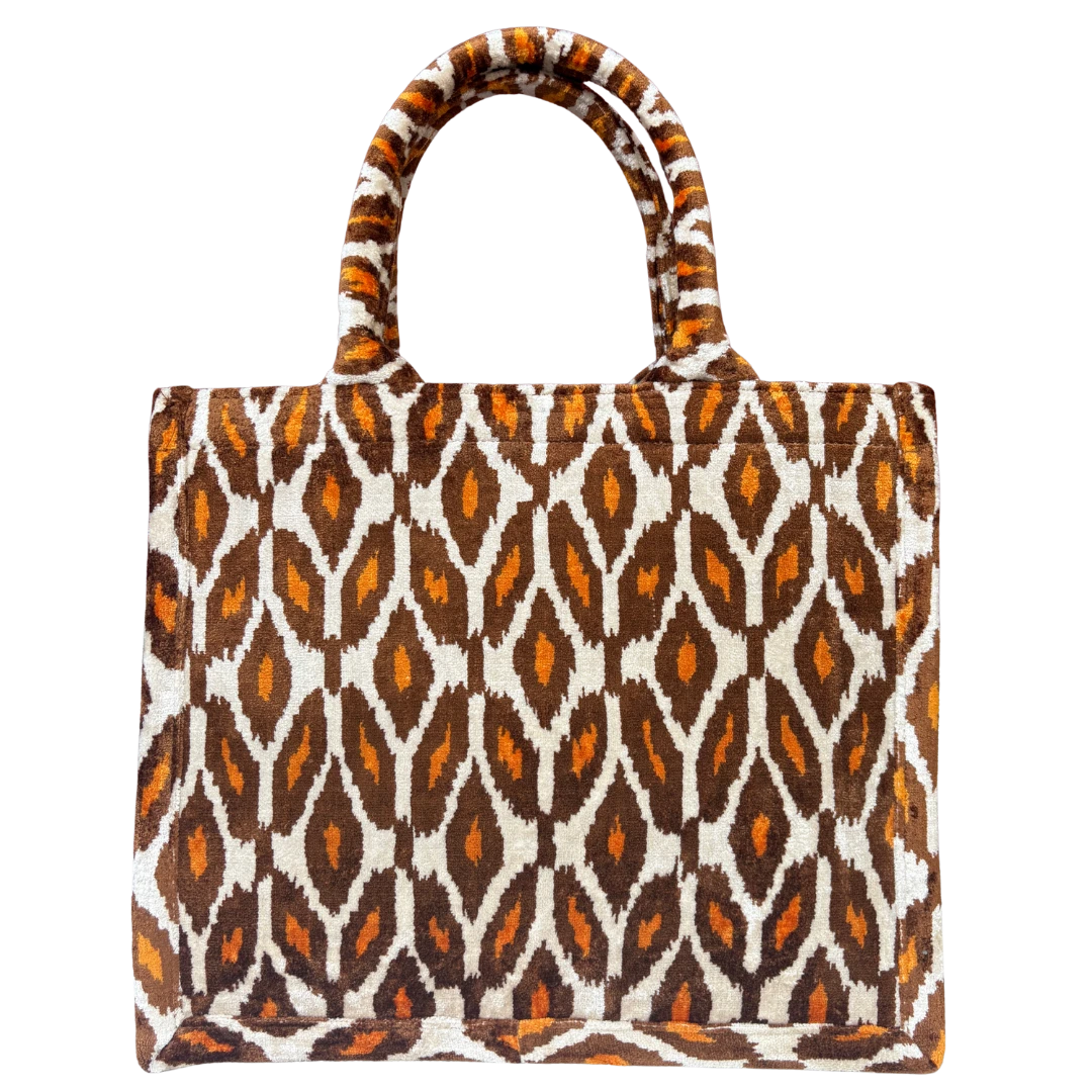 Amber and cream ikat diamond silk velvet tote bag with matching handles, front view