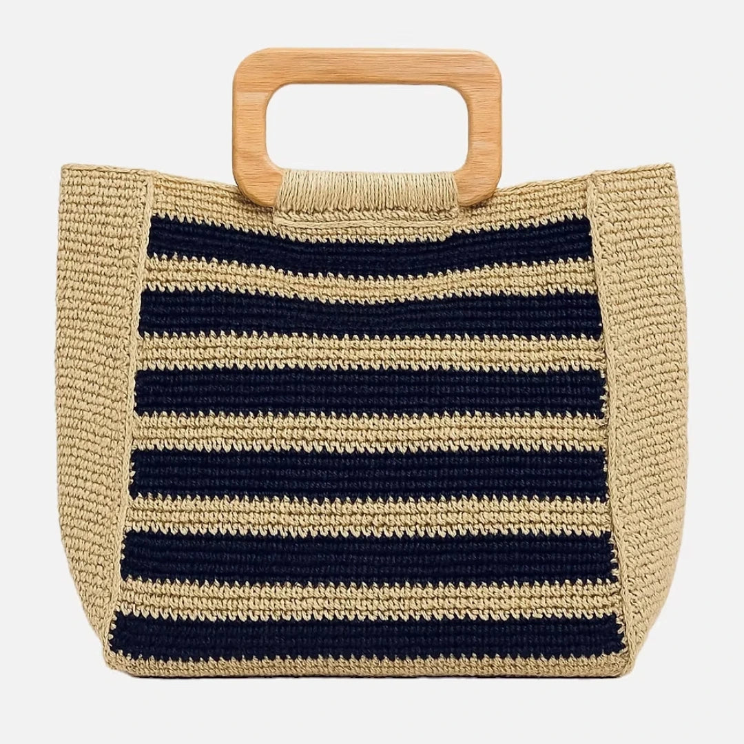 Navy and natural striped crochet raffia tote bag with light wooden top handles, front view