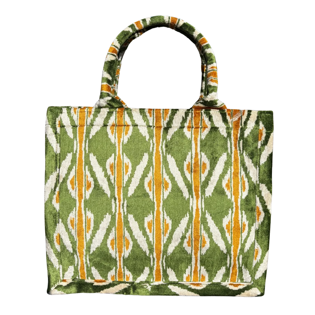 Green, orange and cream feathered ikat chevron silk velvet tote bag with matching handles, front view