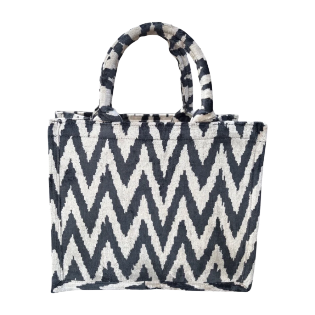 Black and cream chevron zigzag silk velvet tote bag with matching handles, front view