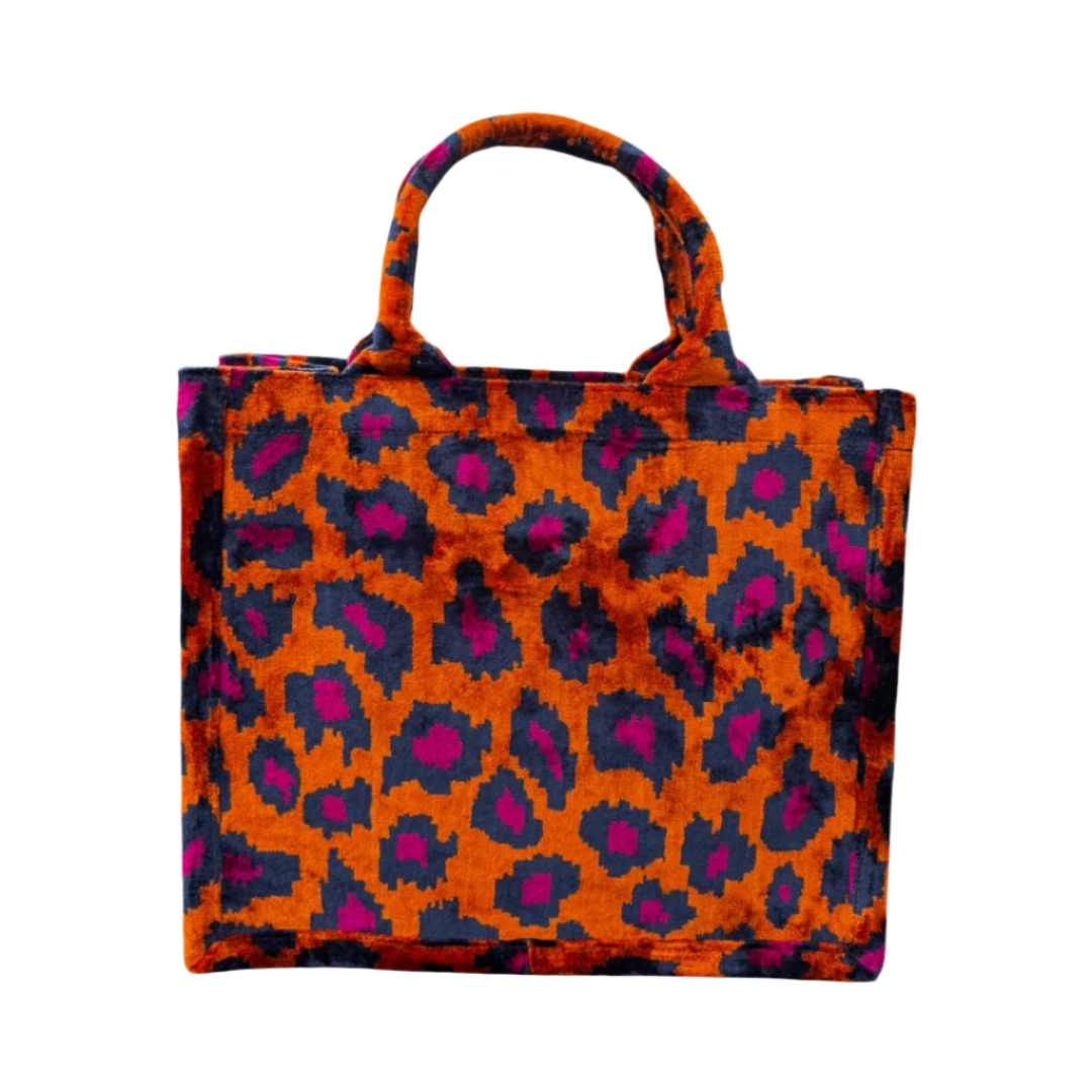 Burnt orange and navy leopard silk velvet tote bag with matching handles, front view