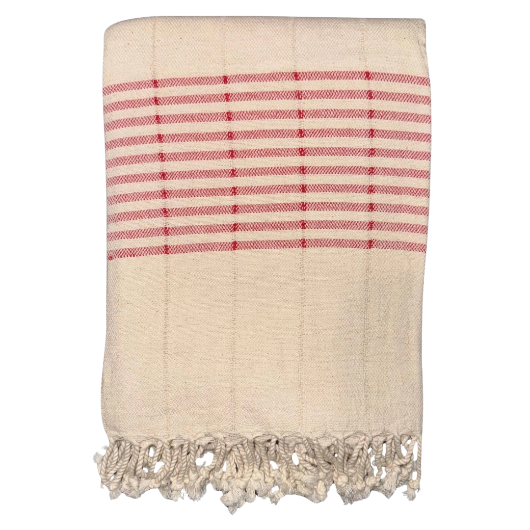 Beige towel with red stripes and lace trim on a white background