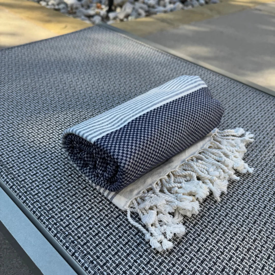 lightweight peshtemal beach towel folded navy