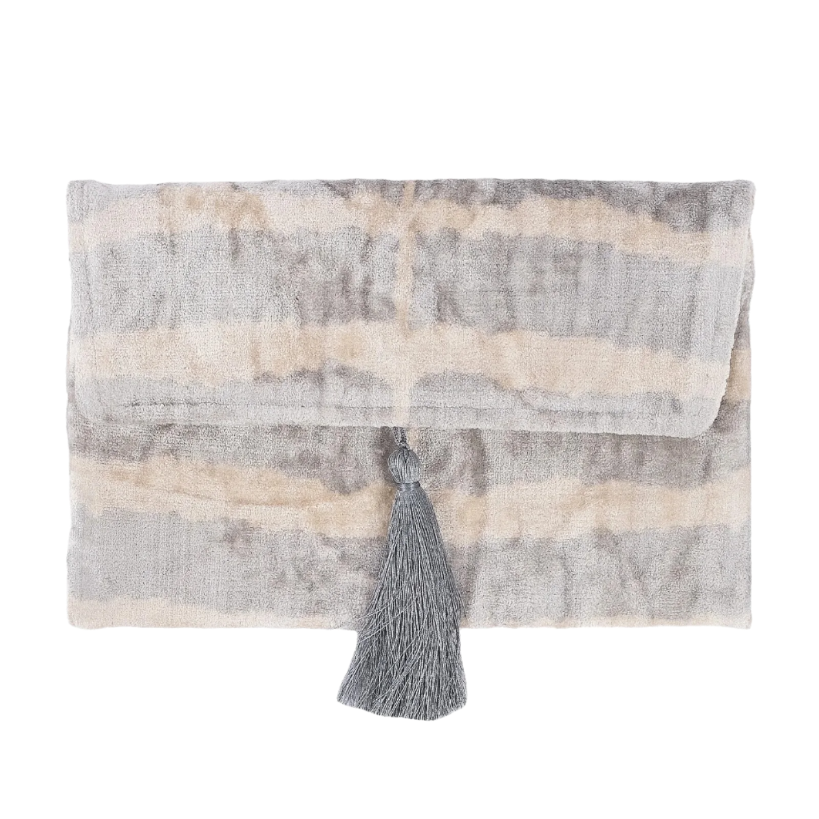 Decorative pillow with a tassel on a white background