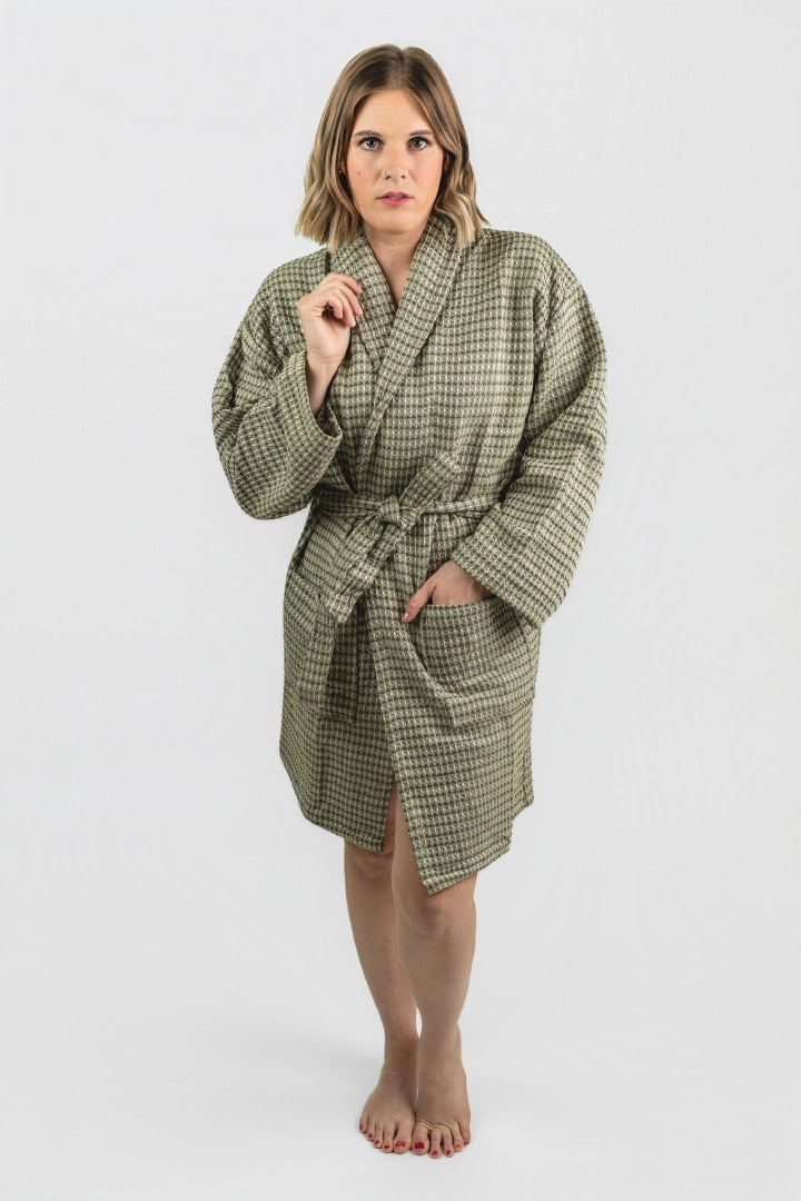 Full-length front view of the Aegean Olive Green waffle peshtemal bathrobe, worn belted
