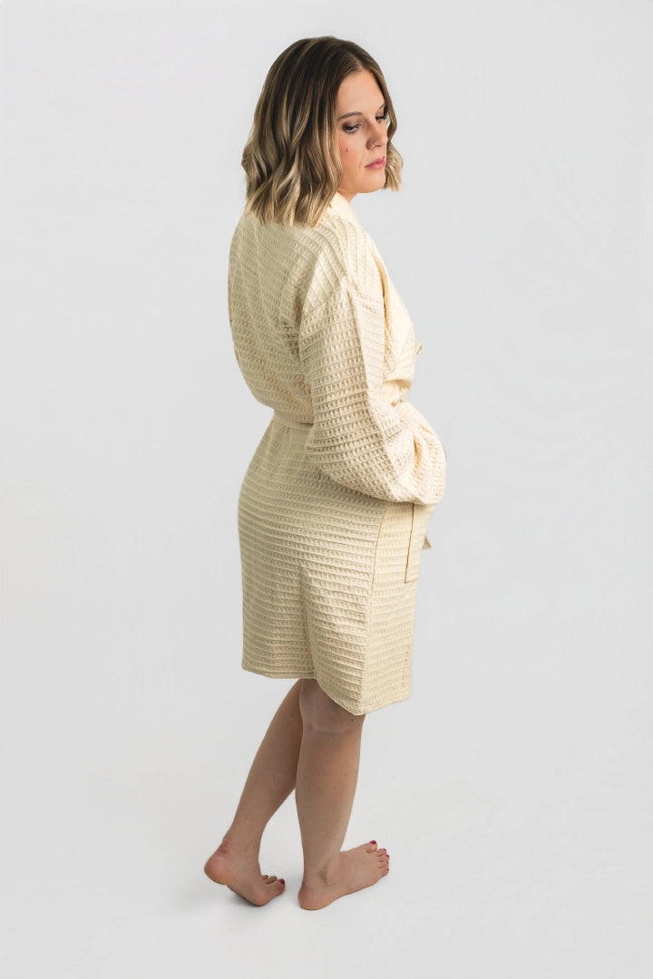 Back view of the Aegean Sand Beige waffle weave peshtemal bathrobe, showing its knee length