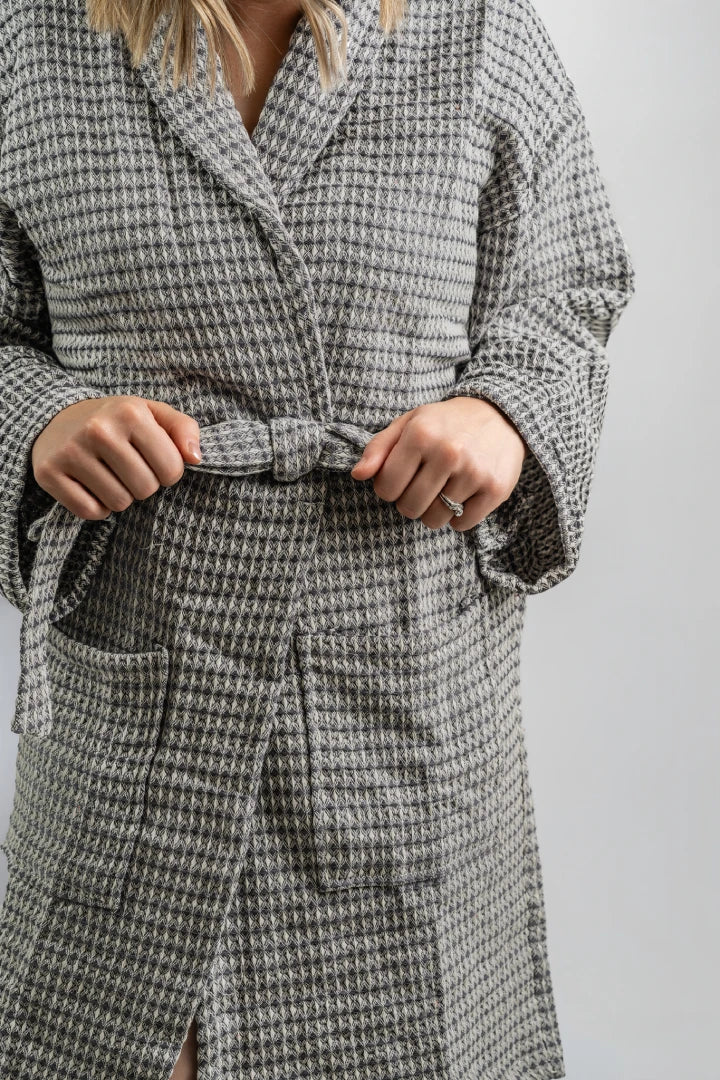 Close-up of the tie belt and waffle weave texture on the Aegean Stone Gray bathrobe