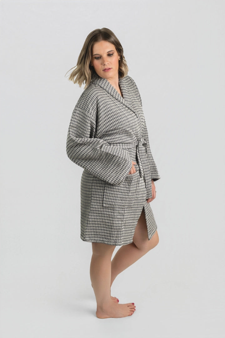 Full-length front view of the Aegean Stone Gray waffle peshtemal bathrobe, worn belted
