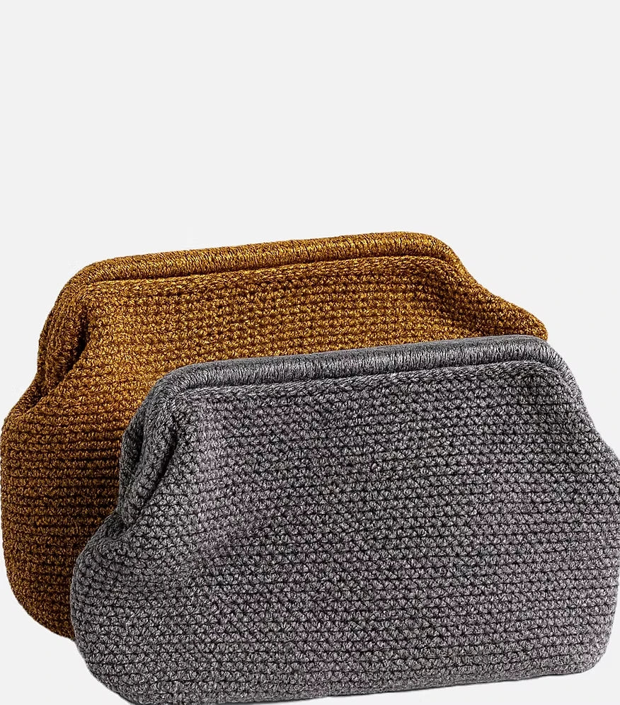 The Sabine metallic crochet clutch in both the gold and silver colourways