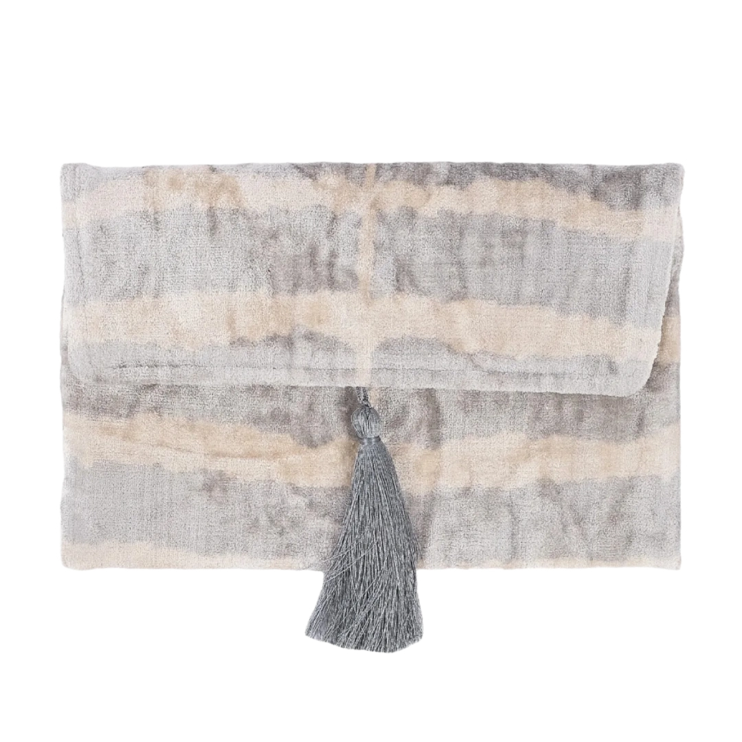 Silver and ivory tiger stripe silk velvet clutch with a grey tassel, front view