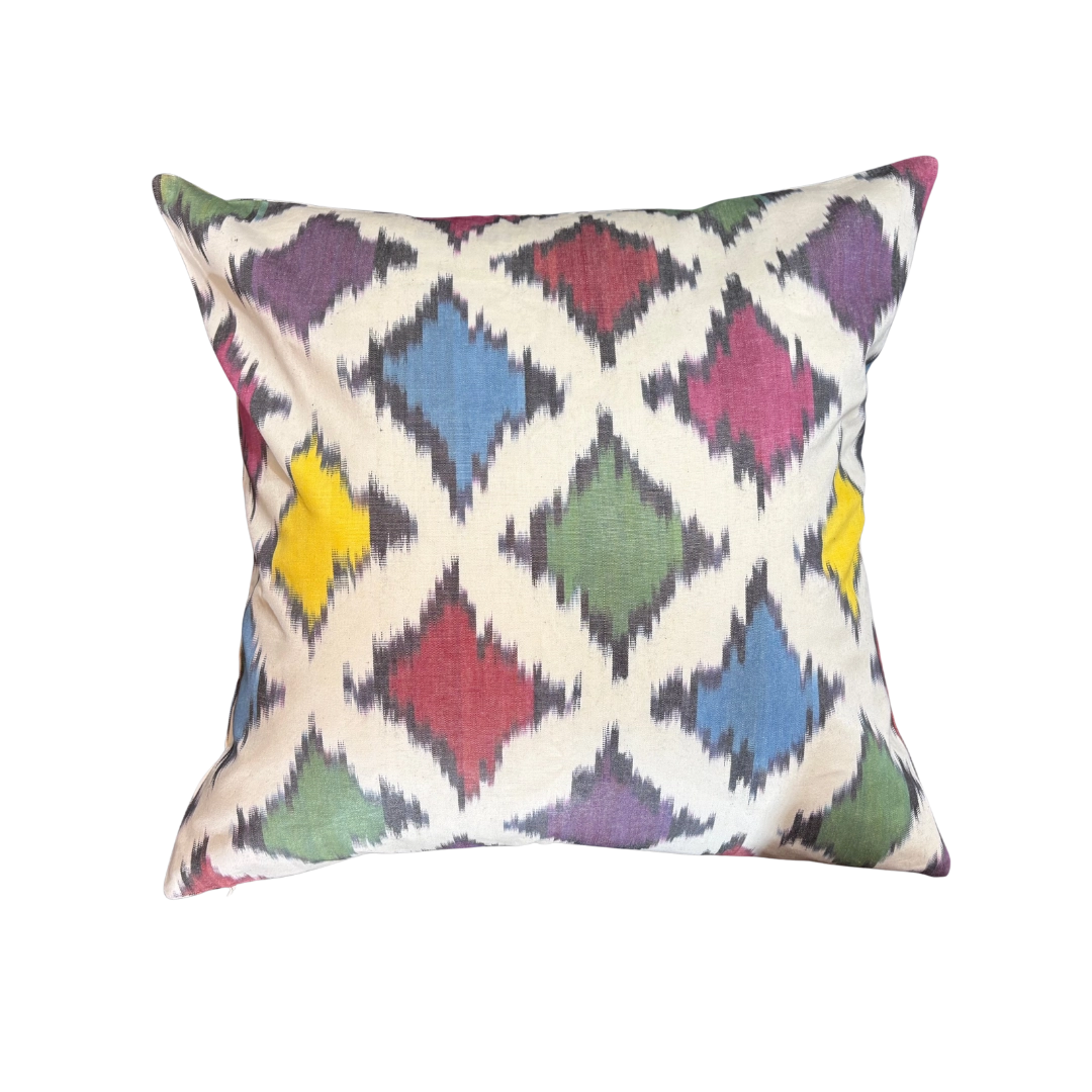 Multicolor ikat throw pillow cover in a diamond lattice on ivory, 20x20
