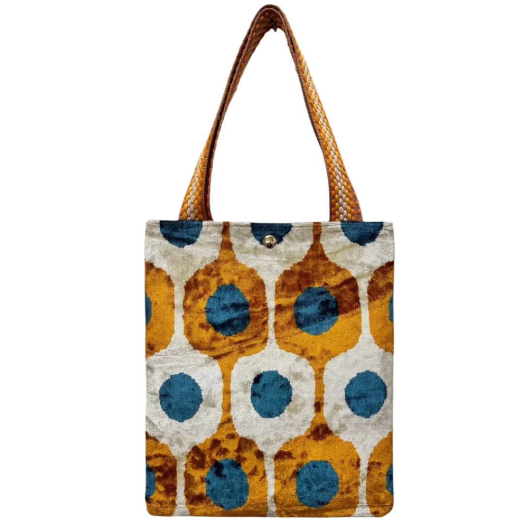 Amber ikat dot silk velvet shoulder bag with teal centres on ivory