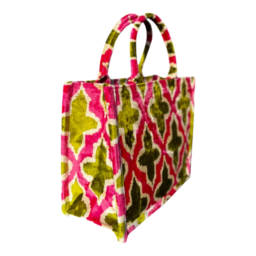 Side view of the Rose Trellis silk velvet tote showing its boxy base and gusset