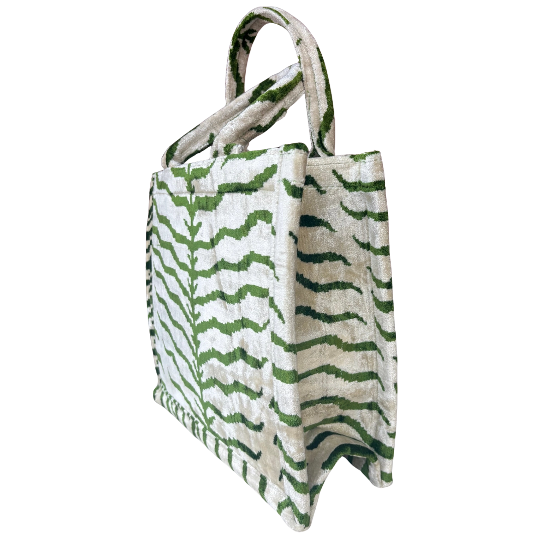 Side view of the Tigris Pattern silk velvet tote showing its boxy base and gusset