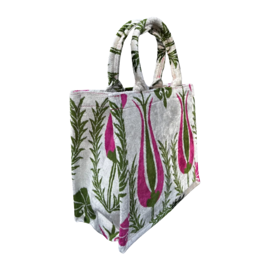 Side view of the Tulip silk velvet tote showing its boxy base and gusset